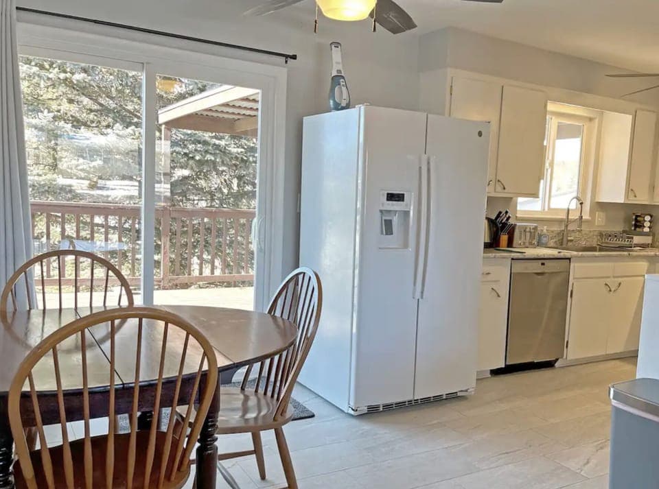 Kitchen with door to outside deck