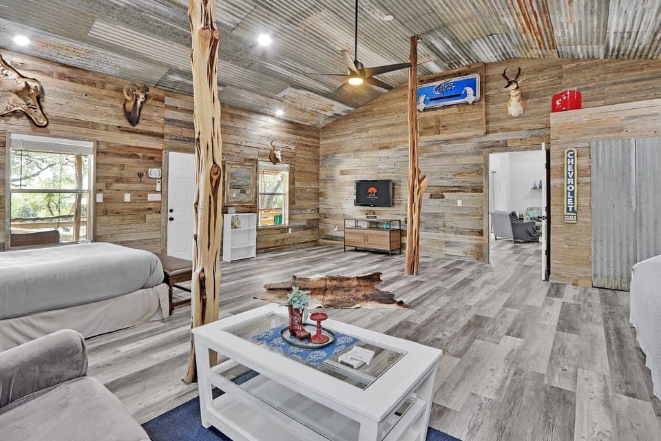 There is a TV across from the queen bed