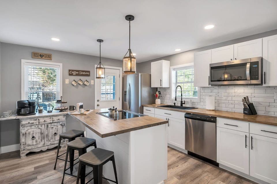 Spacious kitchen with full sized refrigerator, dishwasher, and oven/range!