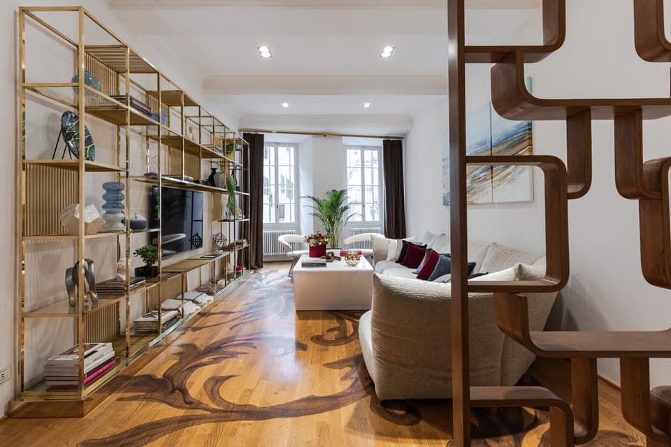 Dining & living room with windows that overlook Via Maggio and the Pitti Palace