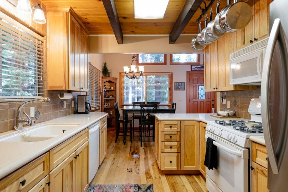 This kitchen offers simplicity with the added benefit of being fully stocked, providing everything you need for cooking, baking, and dining
