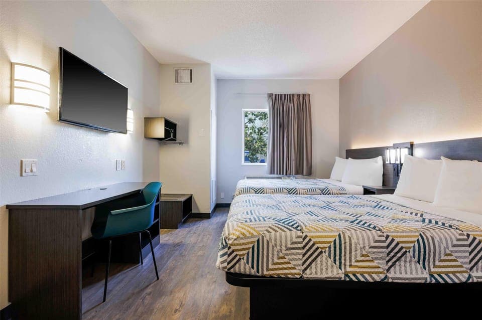 Desk, laptop workspace, blackout drapes, free WiFi