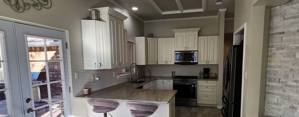 Completely renovated custom kitchen with high end countertops