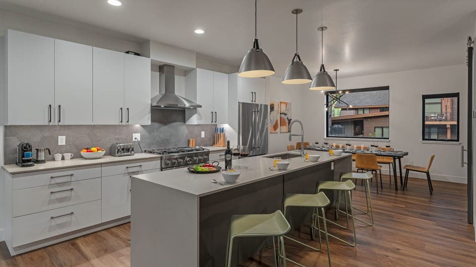 Kitchen, Main Level - With breakfast bar seating