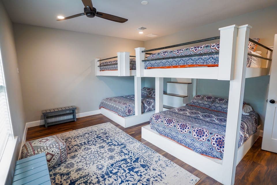 Bedroom 7: 2 queen over queen bunks (4 beds), second floor, pool patio entrance