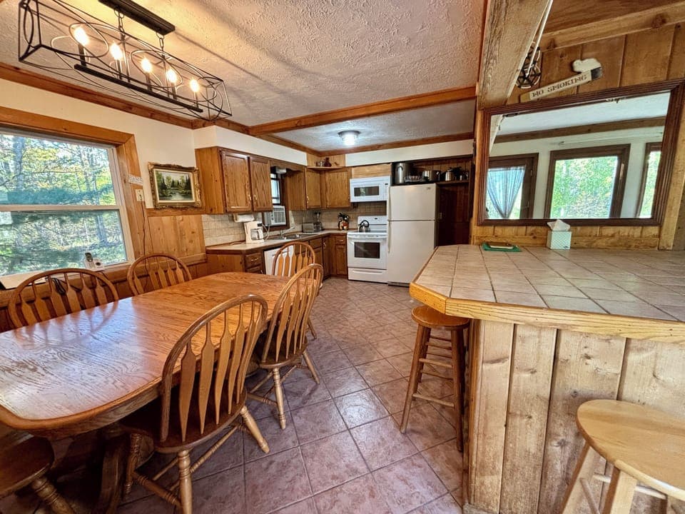 Home 2, second level kitchen & dining area provides 12 seats for meals.