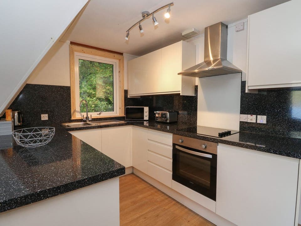 Fridge, electric kettle, toaster, cookware/dishes/utensils