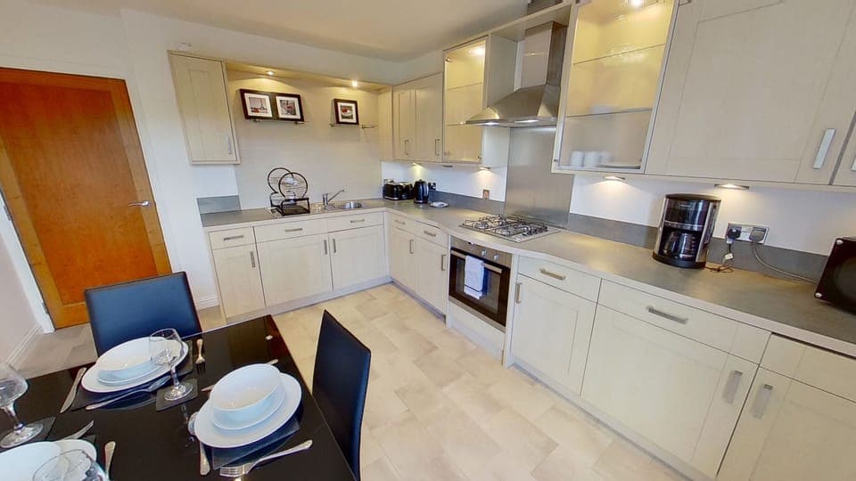 Apartment, 2 Bedrooms | Private kitchen | Fridge, microwave, dishwasher, coffee/tea maker