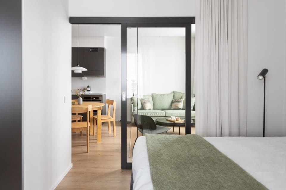 Desk, laptop workspace, blackout drapes, soundproofing