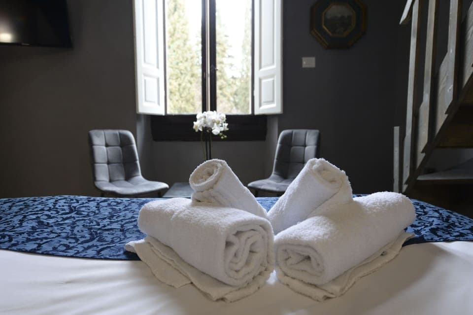 Deluxe Quadruple Room | Hypo-allergenic bedding, minibar, in-room safe, free WiFi