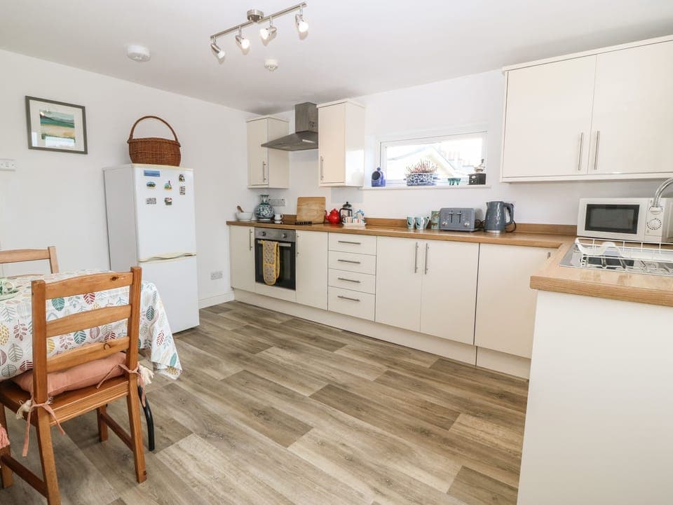 Fridge, electric kettle, toaster, cookware/dishes/utensils