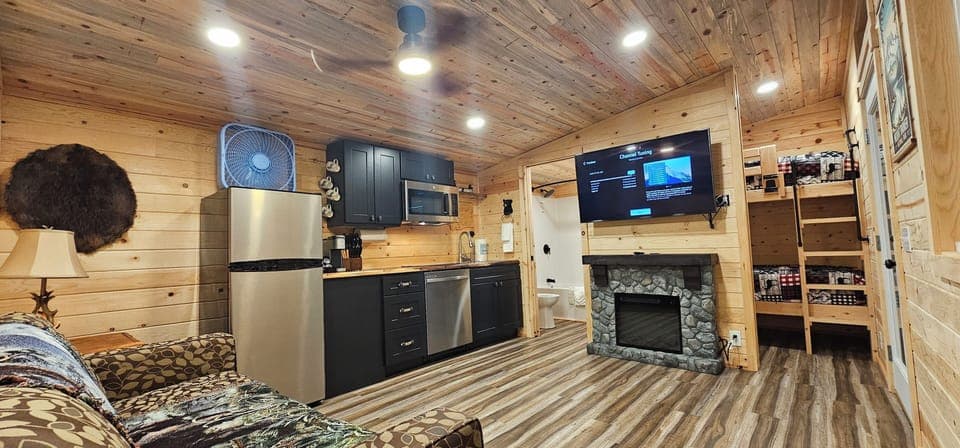 Premium Cabin, 1 Bedroom, Kitchenette | Living area | Flat-screen TV