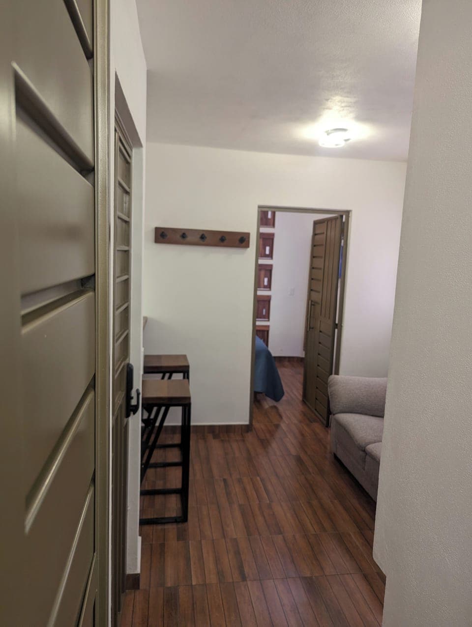 Business Apartment | Living area | 32-inch Smart TV with digital channels, heated floors, smart speakers