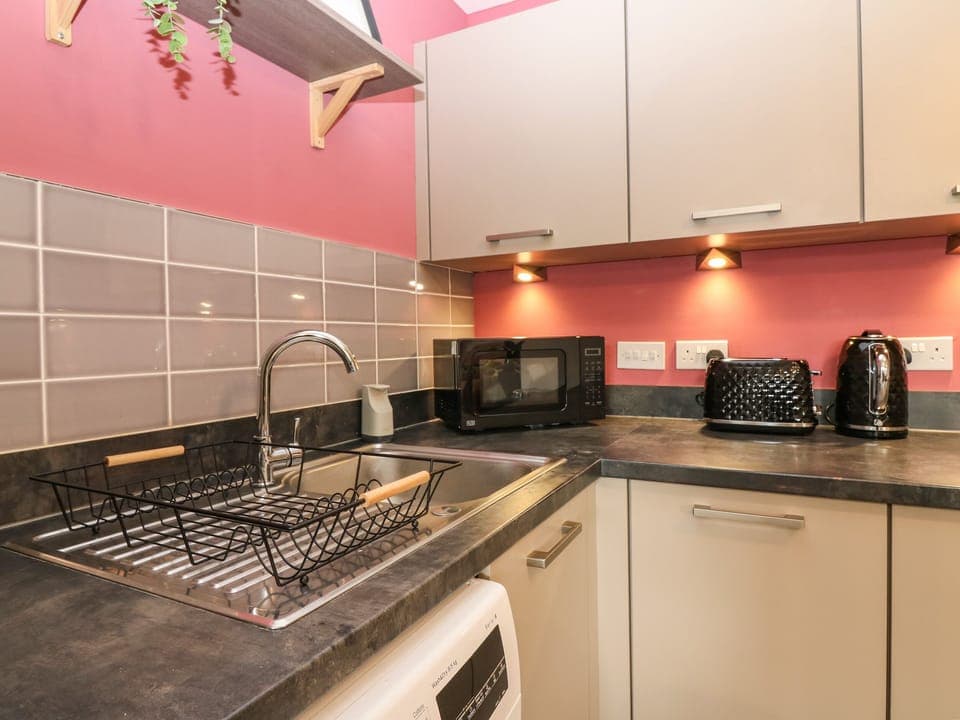 Fridge, electric kettle, toaster, cookware/dishes/utensils