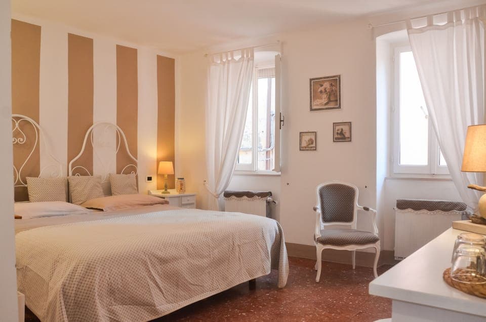 Deluxe Double Room, Private Bathroom, Tower | Down comforters, in-room safe, individually decorated