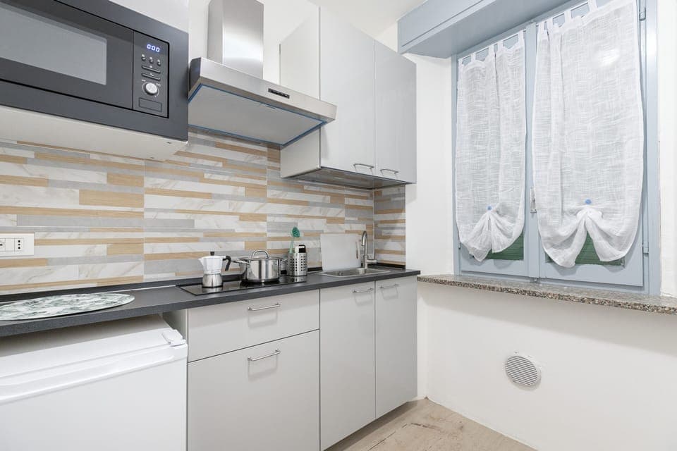 Comfort Apartment | Private kitchen | Microwave, espresso maker, cookware/dishes/utensils