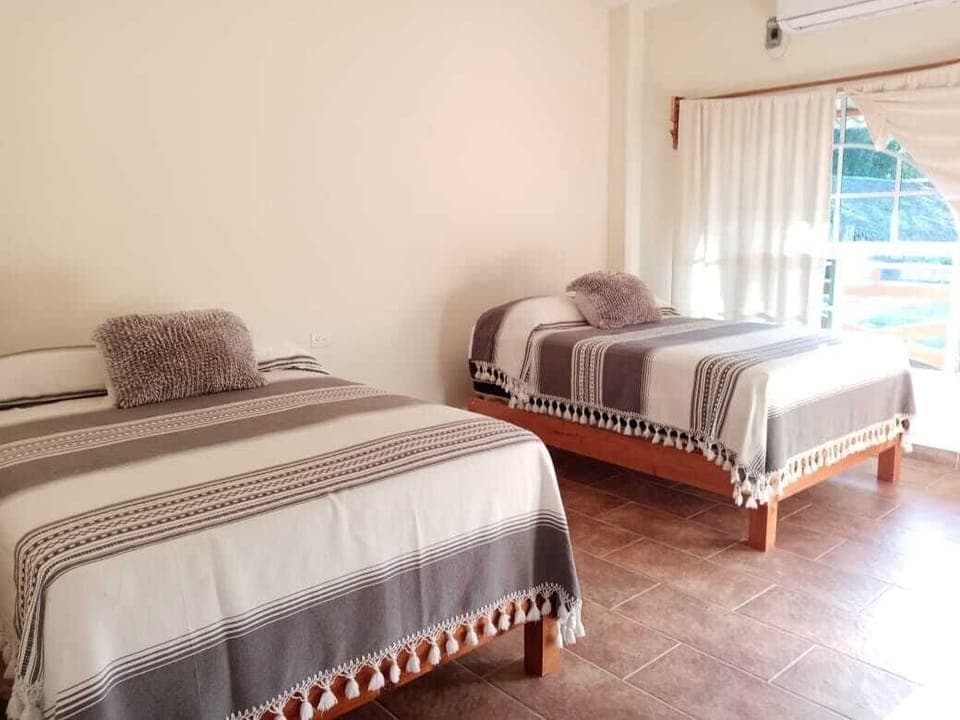 Traditional Quadruple Room | Hypo-allergenic bedding, down comforters, Tempur-Pedic beds