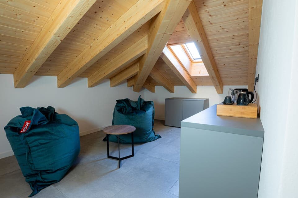 Suite, Sauna, Mountain View | Living area | 43-inch Smart TV with satellite channels