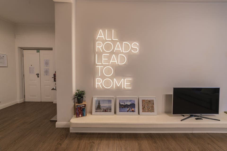 Comfort Apartment, 4 Bedrooms | Living area | 55-inch LED TV with digital channels