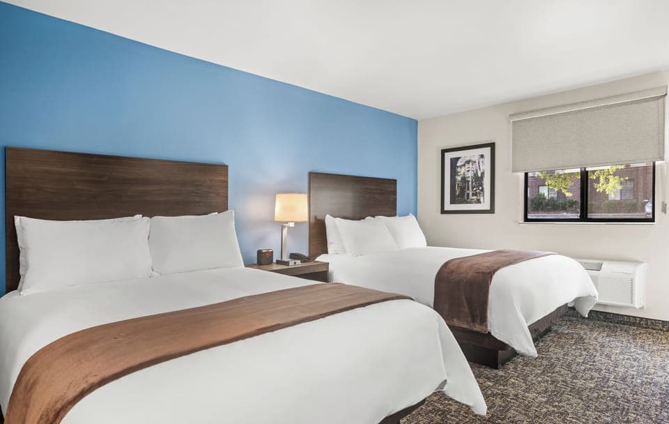 Pillowtop beds, desk, laptop workspace, blackout drapes