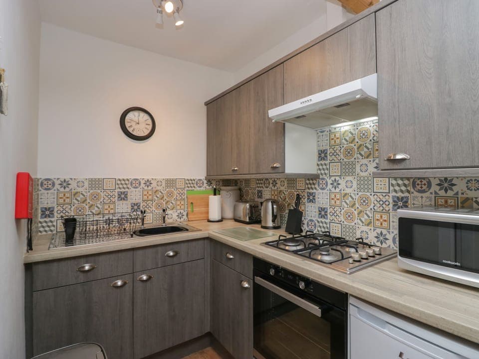 Fridge, electric kettle, toaster, cookware/dishes/utensils