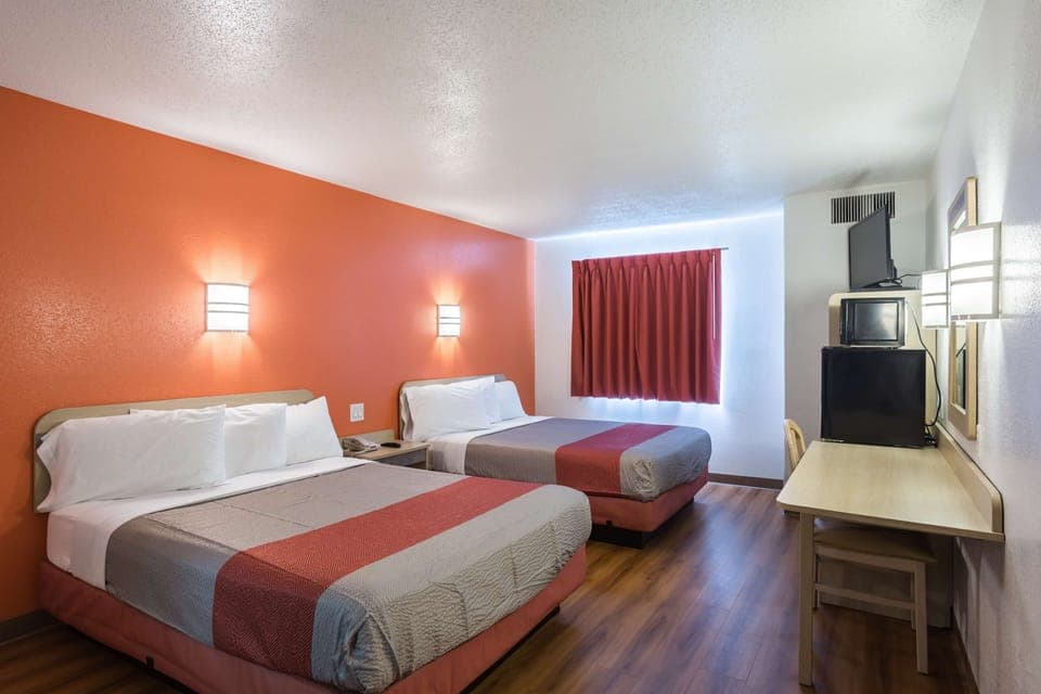 Desk, free WiFi, bed sheets, alarm clocks