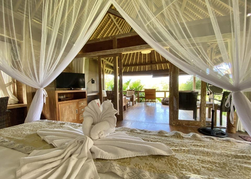 Private Wooden Bungalow | Minibar, in-room safe, desk, bed sheets