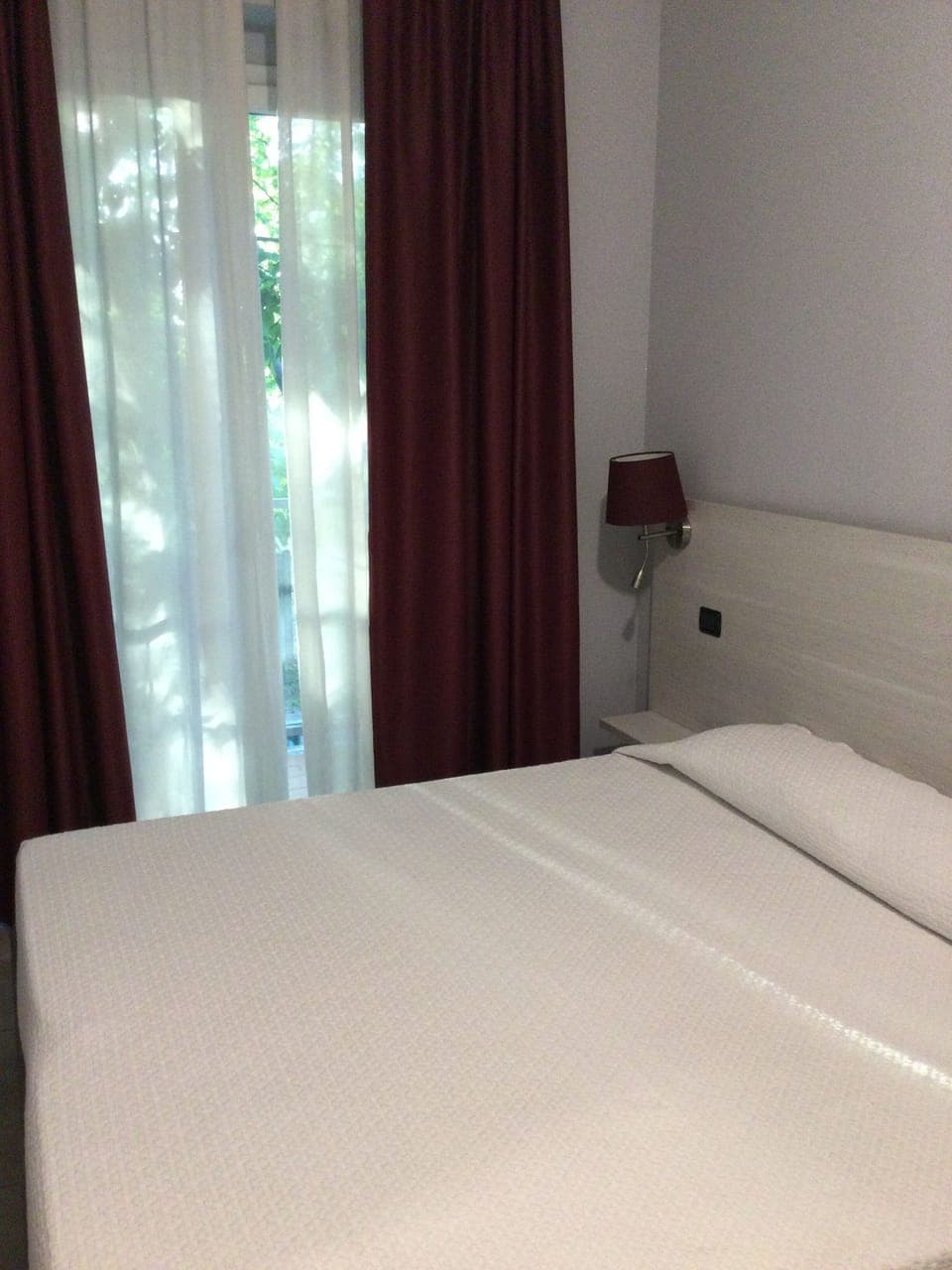 Basic Room, City View | 1 bedroom, in-room safe, blackout drapes, free WiFi