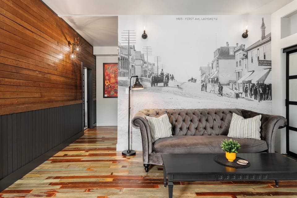 Suite, 1 Queen Bed | Living area | Fireplace