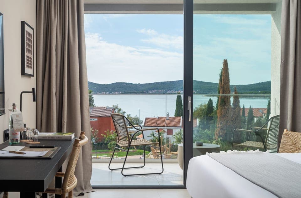Deluxe Double Room, Balcony, Sea View | In-room safe, desk, blackout drapes, iron/ironing board