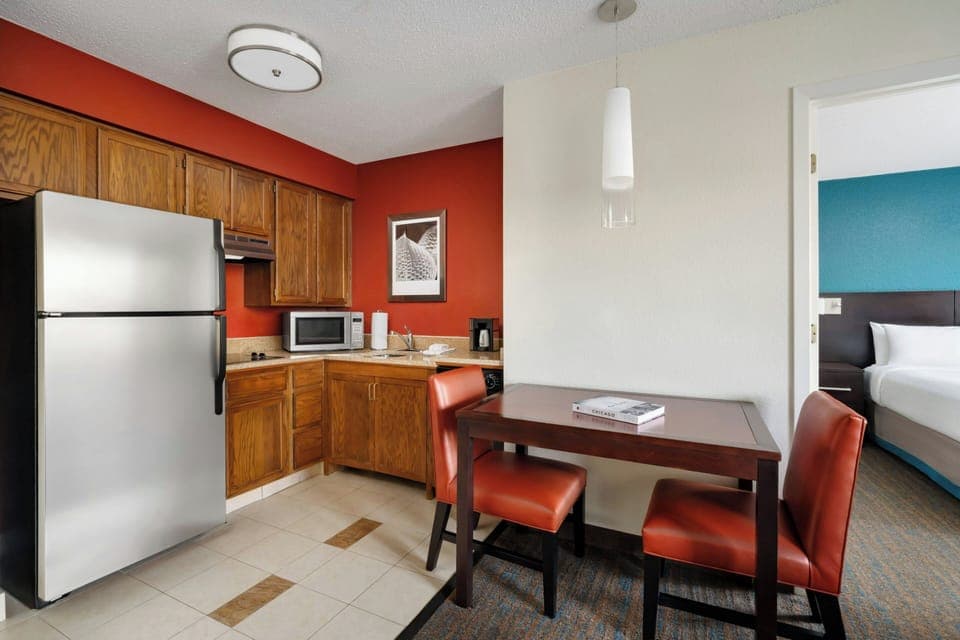 Suite, 1 Bedroom | Private kitchen | Fridge, microwave, dishwasher, coffee/tea maker
