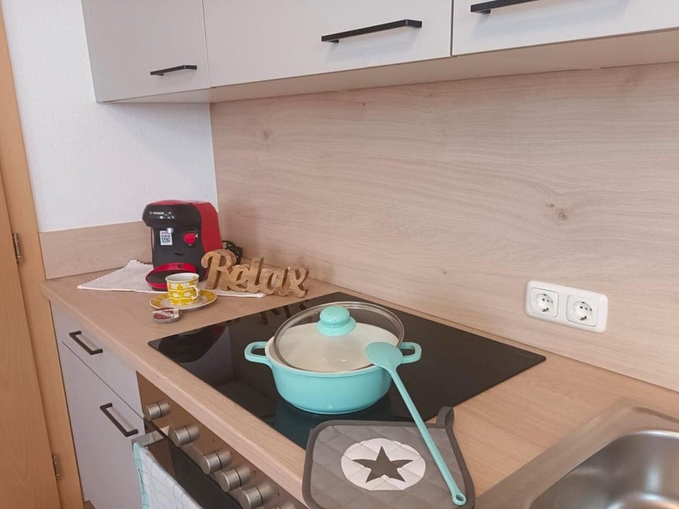 Apartment | Private kitchen | Electric kettle, highchair