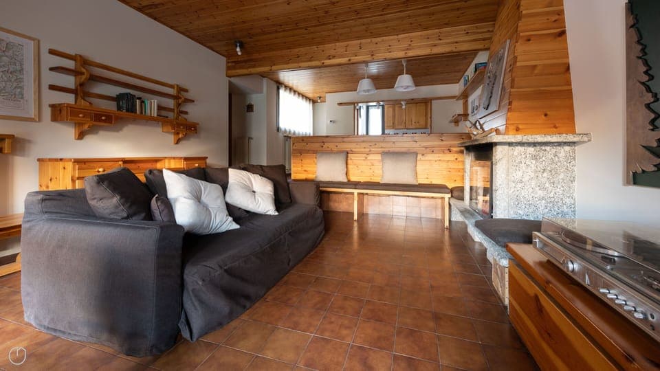 Apartment (3 Bedrooms) | Living area | 55-inch TV with cable channels