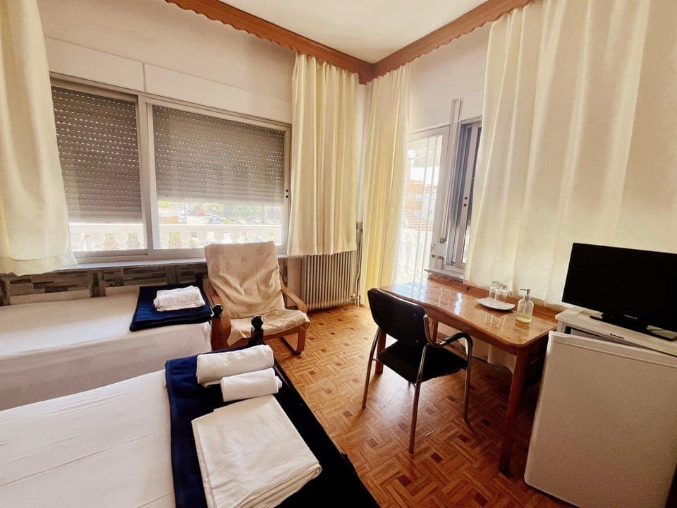 Classic Triple Room, Balcony, Sea View | Desk, laptop workspace, free WiFi, bed sheets