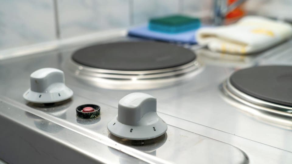 Mini-fridge, stovetop, electric kettle, toaster