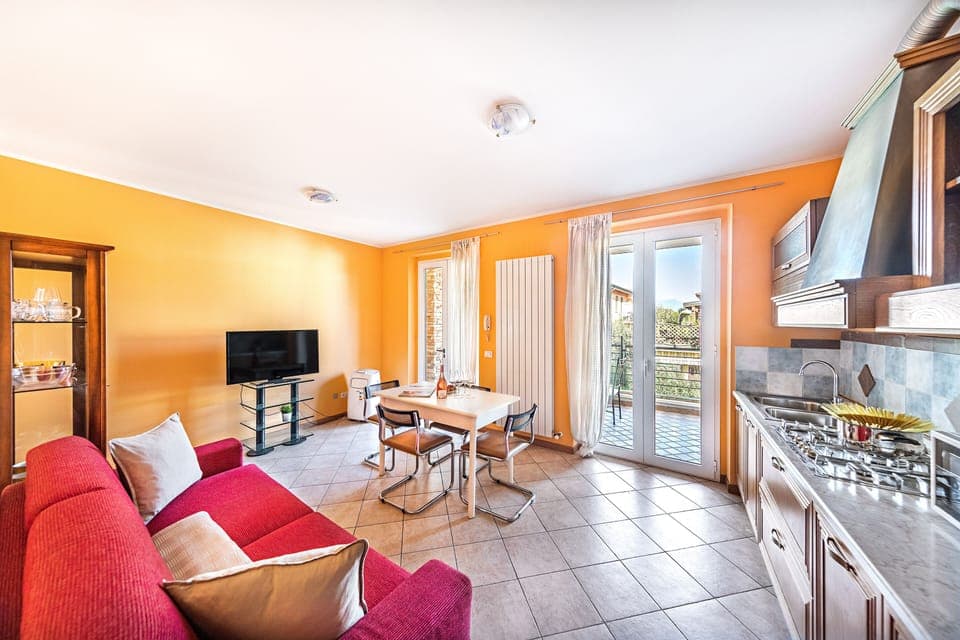 Apartment | Living area | 35-inch flat-screen TV with digital channels