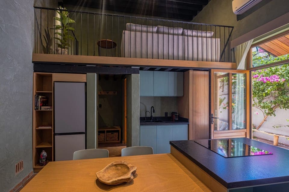 Luxury Studio Suite, Courtyard View | Private kitchen | Full-size fridge, cookware/dishes/utensils