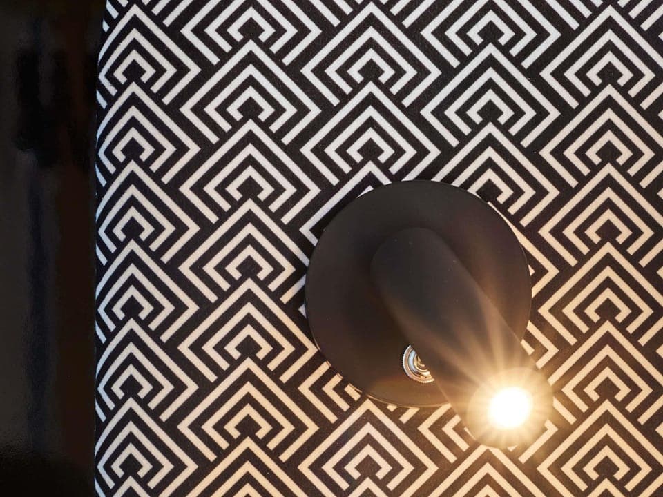 Premium bedding, in-room safe, blackout drapes, soundproofing