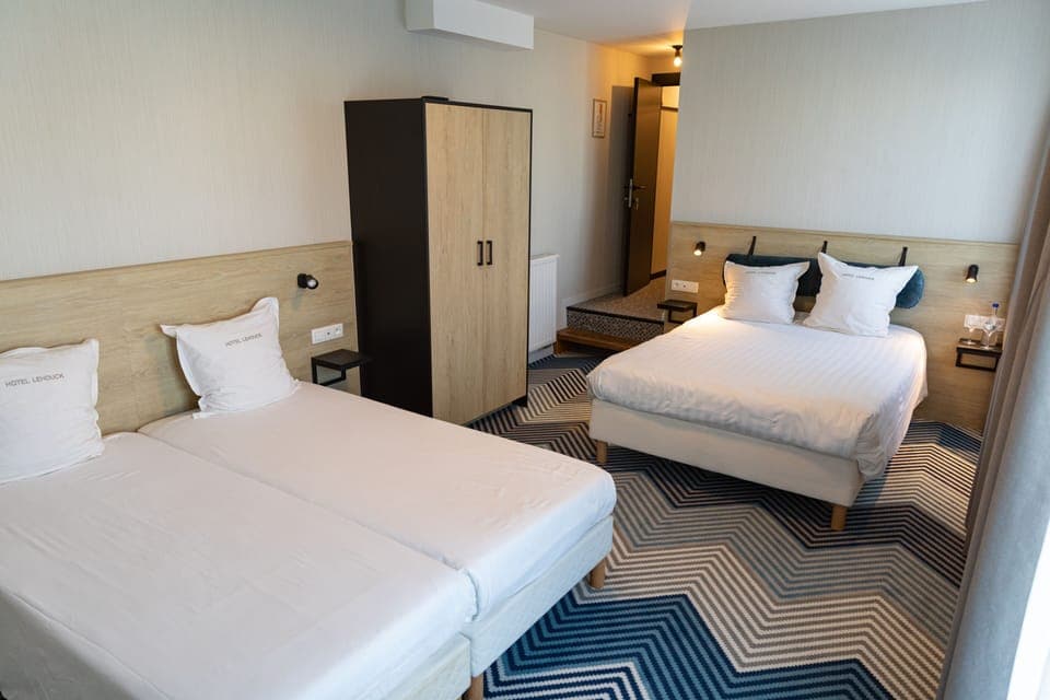 Family Quadruple Room, 1 Bedroom | Blackout drapes, free WiFi, bed sheets