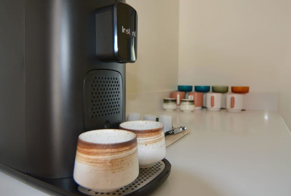 Standard Room, 2 Queen Beds, Kitchenette, Garden View | Coffee and/or coffee maker