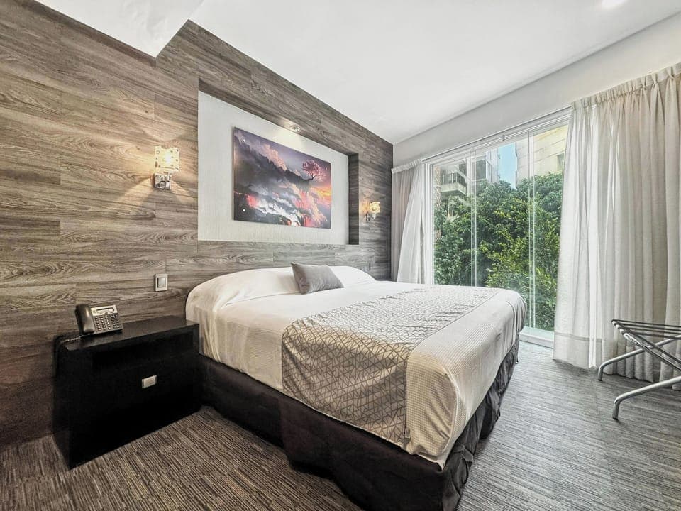 Luxury Apartment, 1 Bedroom, City View | 1 bedroom, desk, laptop workspace, blackout drapes