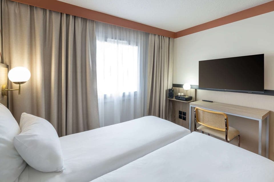 Premium bedding, individually furnished, desk, laptop workspace