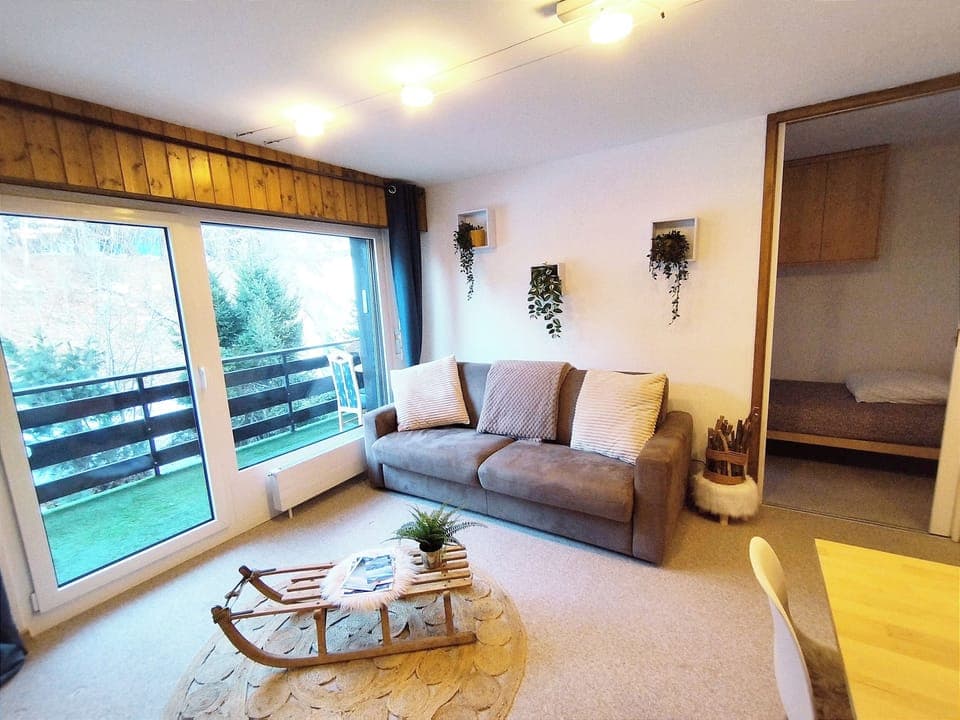 Family Apartment, Mountain View | Living area | Flat-screen TV
