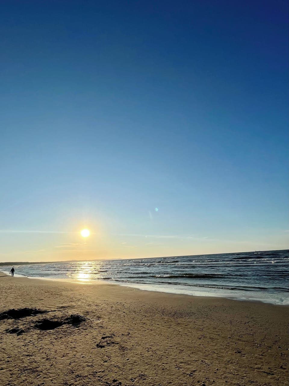 On the beach, sun loungers