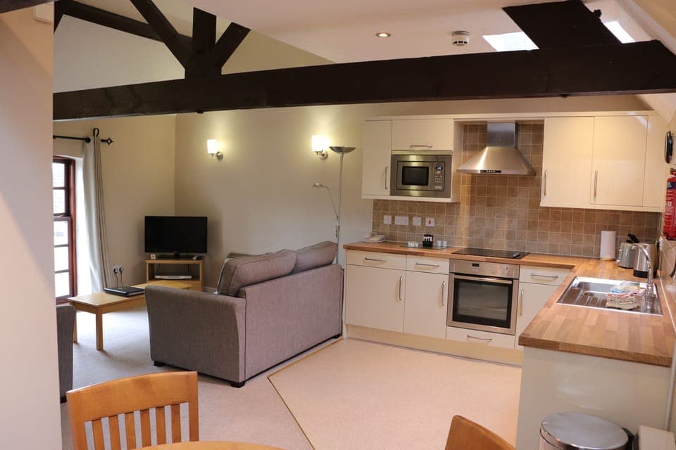 Stable Mews Two Bedroom Apartment | Living area | TV