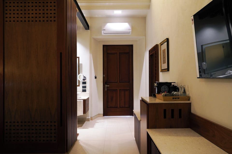 Junior Suite, City View | Premium bedding, minibar, in-room safe, desk