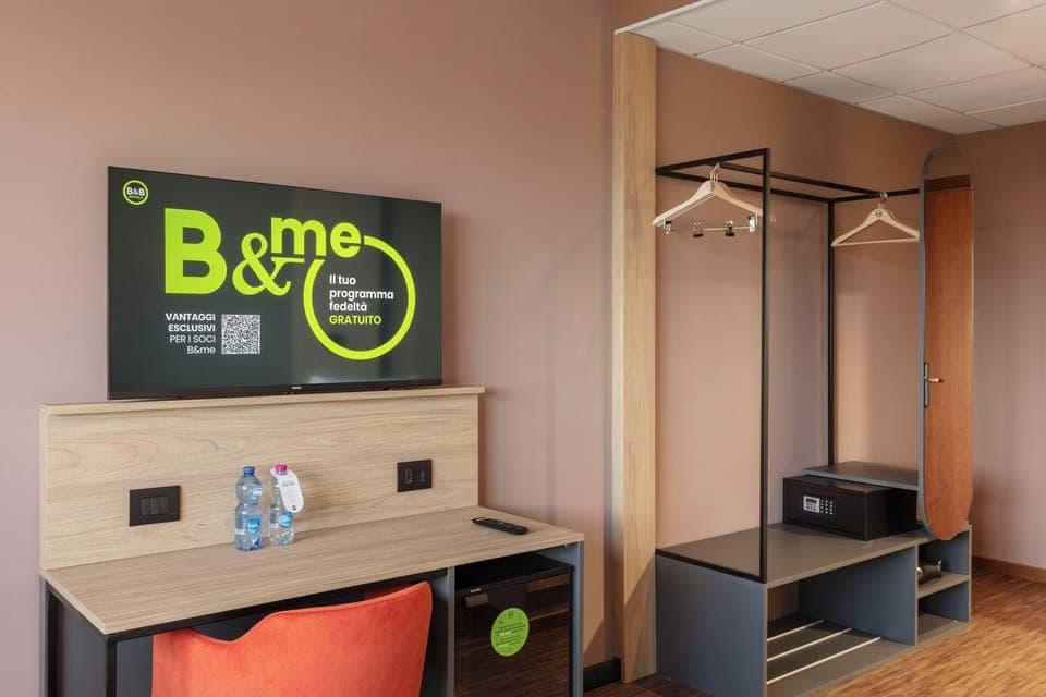 Hypo-allergenic bedding, down comforters, desk, laptop workspace