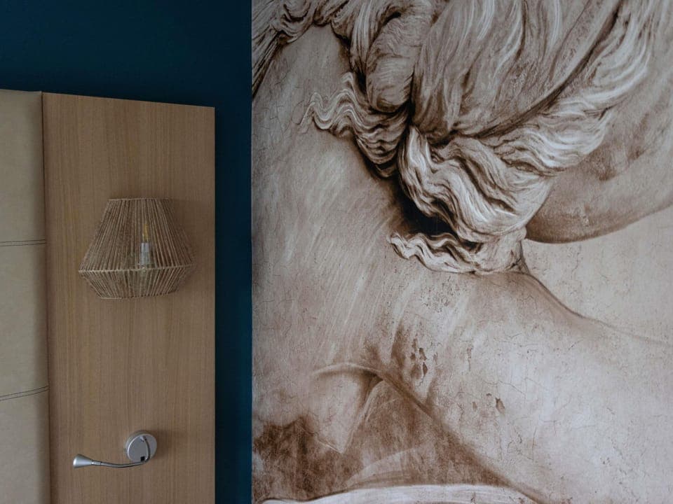 Desk, blackout drapes, soundproofing, free cribs/infant beds