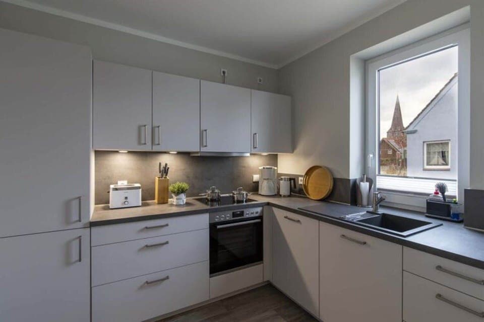 Apartment | Private kitchen | Electric kettle, toaster, highchair