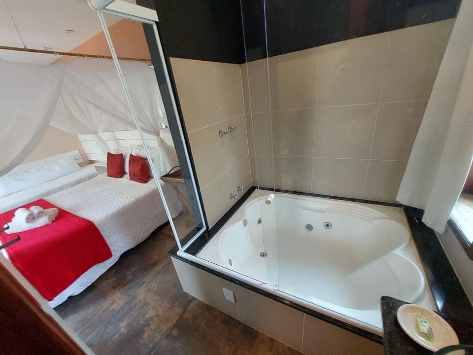 Romantic Suite, 1 Queen Bed, Non Smoking, Air conditioning | Free WiFi, bed sheets